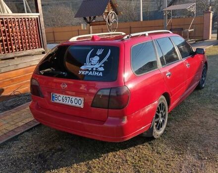 Красный Ниссан Примера, объемом двигателя 2 л и пробегом 222 тыс. км за 3650 $, фото 3 на Automoto.ua