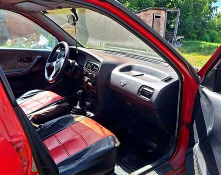 Красный Ниссан Примера, объемом двигателя 2 л и пробегом 250 тыс. км за 1560 $, фото 4 на Automoto.ua
