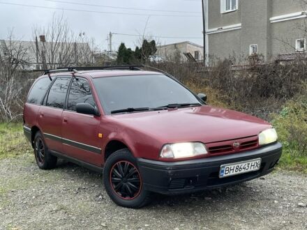 Червоний Ніссан Прімера, об'ємом двигуна 2 л та пробігом 400 тис. км за 1199 $, фото 1 на Automoto.ua