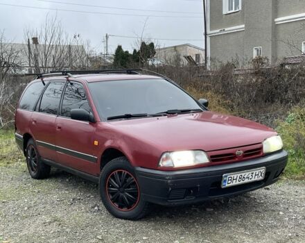 Красный Ниссан Примера, объемом двигателя 2 л и пробегом 400 тыс. км за 1199 $, фото 1 на Automoto.ua