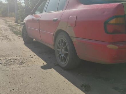 Ниссан Примера 1991 в Раздельной на Automoto.ua Красный Ниссан Примера, объемом двигателя 2 л и пробегом 320 тыс. км за 1500 $, фото 1 на Automoto.ua