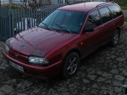 Красный Ниссан Примера, объемом двигателя 2 л и пробегом 460 тыс. км за 1500 $, фото 1 на Automoto.ua