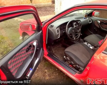 Красный Ниссан Примера, объемом двигателя 1.6 л и пробегом 200 тыс. км за 1300 $, фото 1 на Automoto.ua