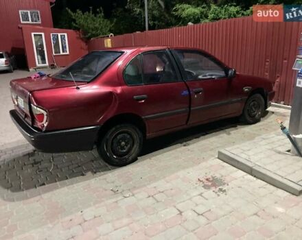 Красный Ниссан Примера, объемом двигателя 1.6 л и пробегом 300 тыс. км за 600 $, фото 1 на Automoto.ua