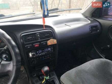 Красный Ниссан Примера, объемом двигателя 1.6 л и пробегом 230 тыс. км за 2500 $, фото 1 на Automoto.ua