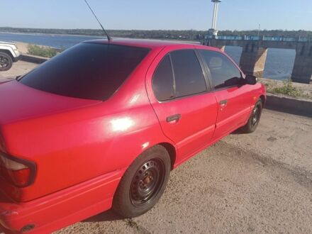 Ниссан Примера 1995 в Запорожье на Automoto.ua Красный Ниссан Примера, объемом двигателя 2 л и пробегом 300 тыс. км за 2800 $, фото 1 на Automoto.ua