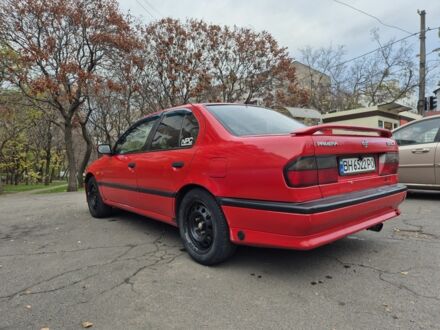 Красный Ниссан Примера, объемом двигателя 2 л и пробегом 470 тыс. км за 1800 $, фото 1 на Automoto.ua