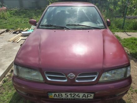 Красный Ниссан Примера, объемом двигателя 1.6 л и пробегом 320 тыс. км за 1700 $, фото 1 на Automoto.ua
