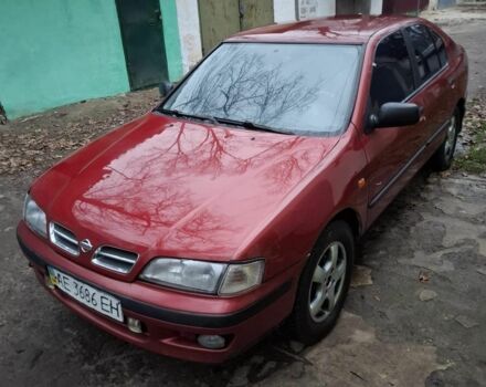 Красный Ниссан Примера, объемом двигателя 2 л и пробегом 220 тыс. км за 2300 $, фото 1 на Automoto.ua