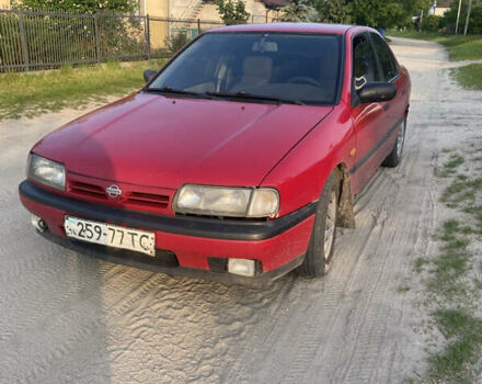 Червоний Ніссан Прімера, об'ємом двигуна 2 л та пробігом 260 тис. км за 1499 $, фото 1 на Automoto.ua