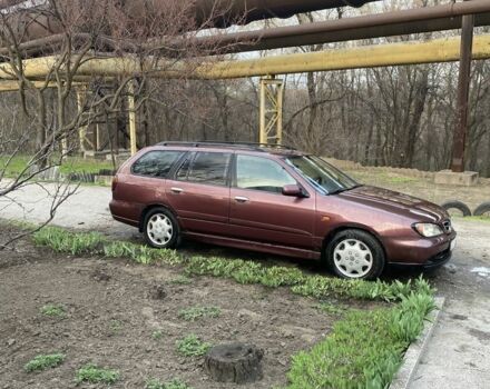 Красный Ниссан Примера, объемом двигателя 2 л и пробегом 500 тыс. км за 1500 $, фото 1 на Automoto.ua