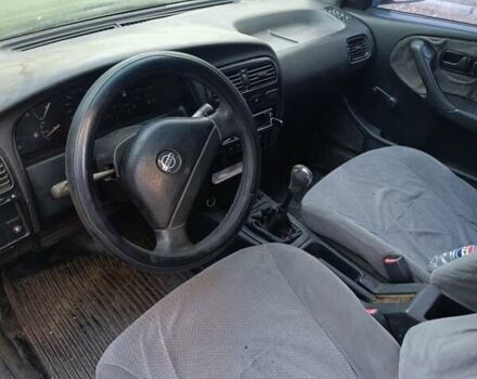 Серый Ниссан Примера, объемом двигателя 2 л и пробегом 658 тыс. км за 800 $, фото 6 на Automoto.ua