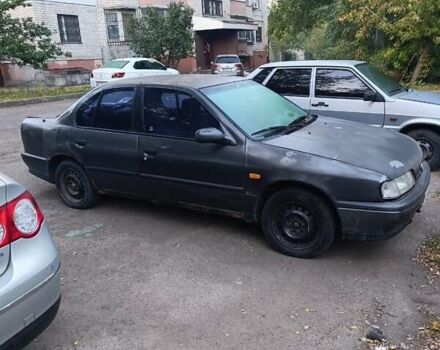 Серый Ниссан Примера, объемом двигателя 2 л и пробегом 658 тыс. км за 800 $, фото 1 на Automoto.ua