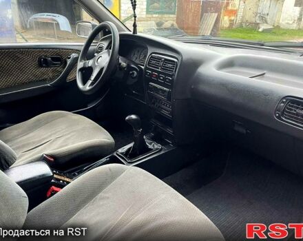 Сірий Ніссан Прімера, об'ємом двигуна 2 л та пробігом 268 тис. км за 1600 $, фото 4 на Automoto.ua