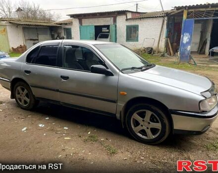 Сірий Ніссан Прімера, об'ємом двигуна 2 л та пробігом 268 тис. км за 1600 $, фото 1 на Automoto.ua