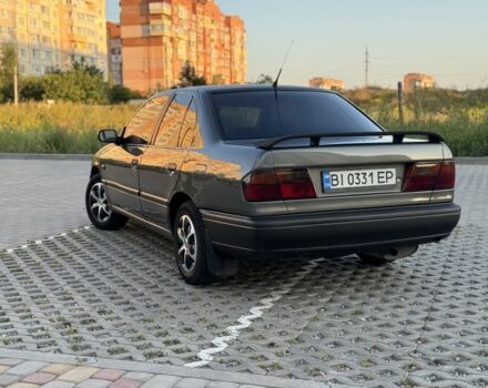 Сірий Ніссан Прімера, об'ємом двигуна 2 л та пробігом 400 тис. км за 2100 $, фото 7 на Automoto.ua
