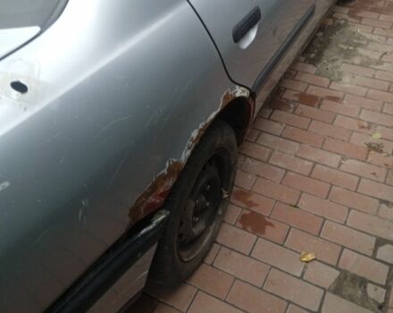 Серый Ниссан Примера, объемом двигателя 2 л и пробегом 350 тыс. км за 709 $, фото 1 на Automoto.ua