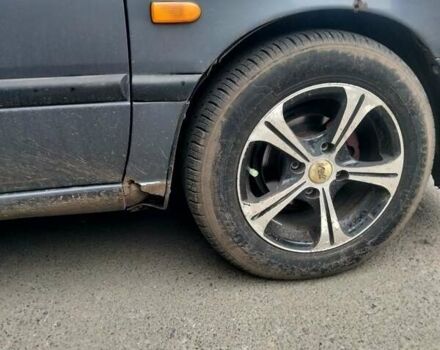 Серый Ниссан Примера, объемом двигателя 1.6 л и пробегом 274 тыс. км за 1900 $, фото 3 на Automoto.ua