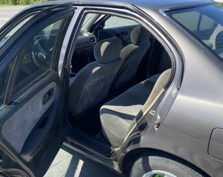 Сірий Ніссан Прімера, об'ємом двигуна 2 л та пробігом 354 тис. км за 1400 $, фото 2 на Automoto.ua