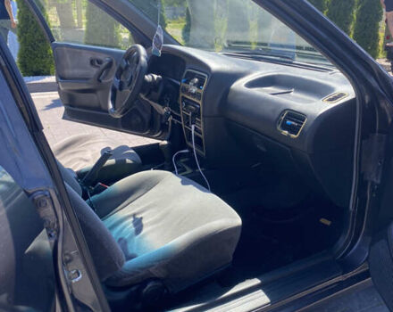 Сірий Ніссан Прімера, об'ємом двигуна 2 л та пробігом 354 тис. км за 1400 $, фото 4 на Automoto.ua