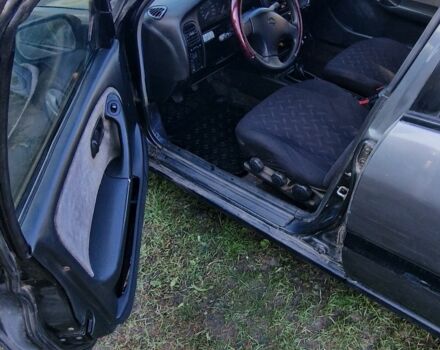 Серый Ниссан Примера, объемом двигателя 1.6 л и пробегом 300 тыс. км за 1500 $, фото 4 на Automoto.ua