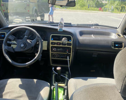 Сірий Ніссан Прімера, об'ємом двигуна 2 л та пробігом 354 тис. км за 1400 $, фото 7 на Automoto.ua