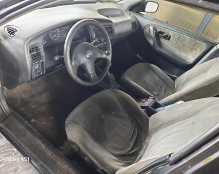 Серый Ниссан Примера, объемом двигателя 1.6 л и пробегом 280 тыс. км за 1000 $, фото 13 на Automoto.ua