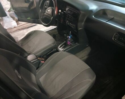 Сірий Ніссан Прімера, об'ємом двигуна 2 л та пробігом 250 тис. км за 1350 $, фото 4 на Automoto.ua