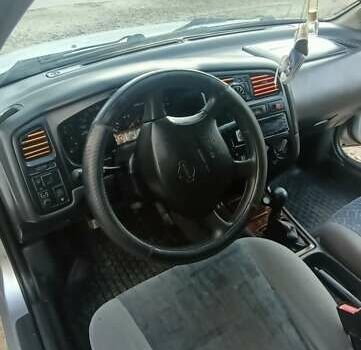 Серый Ниссан Примера, объемом двигателя 2 л и пробегом 350 тыс. км за 2300 $, фото 9 на Automoto.ua