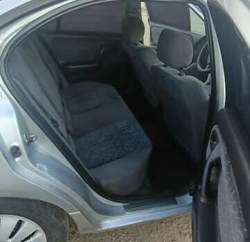 Серый Ниссан Примера, объемом двигателя 2 л и пробегом 350 тыс. км за 2300 $, фото 13 на Automoto.ua