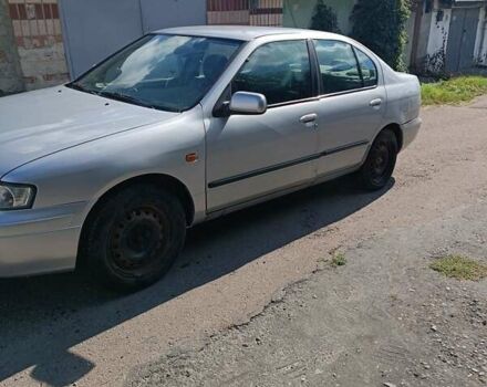 Серый Ниссан Примера, объемом двигателя 1.6 л и пробегом 213 тыс. км за 2600 $, фото 2 на Automoto.ua
