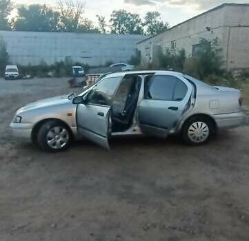 Серый Ниссан Примера, объемом двигателя 2 л и пробегом 350 тыс. км за 2300 $, фото 1 на Automoto.ua