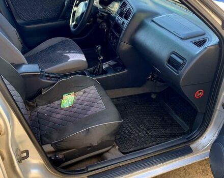 Сірий Ніссан Прімера, об'ємом двигуна 2 л та пробігом 300 тис. км за 2000 $, фото 2 на Automoto.ua