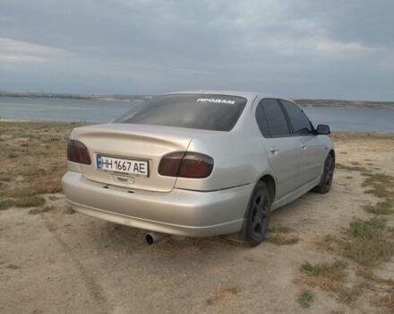 Сірий Ніссан Прімера, об'ємом двигуна 2 л та пробігом 200 тис. км за 2600 $, фото 3 на Automoto.ua