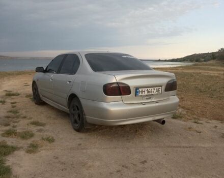 Сірий Ніссан Прімера, об'ємом двигуна 2 л та пробігом 200 тис. км за 2600 $, фото 7 на Automoto.ua