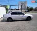 Сірий Ніссан Прімера, об'ємом двигуна 2 л та пробігом 200 тис. км за 3499 $, фото 4 на Automoto.ua