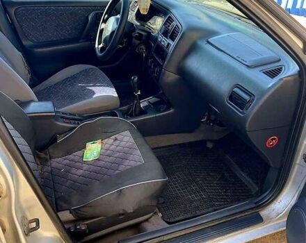 Сірий Ніссан Прімера, об'ємом двигуна 2 л та пробігом 300 тис. км за 2000 $, фото 1 на Automoto.ua