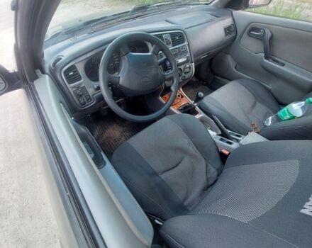 Серый Ниссан Примера, объемом двигателя 1.6 л и пробегом 400 тыс. км за 2000 $, фото 1 на Automoto.ua