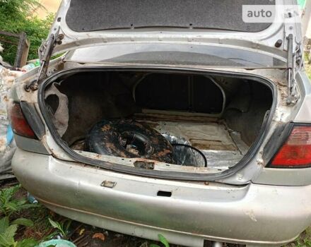 Серый Ниссан Примера, объемом двигателя 2 л и пробегом 319 тыс. км за 1200 $, фото 5 на Automoto.ua