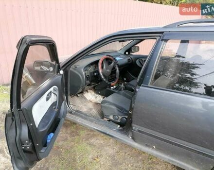 Сірий Ніссан Прімера, об'ємом двигуна 2 л та пробігом 333 тис. км за 1300 $, фото 4 на Automoto.ua