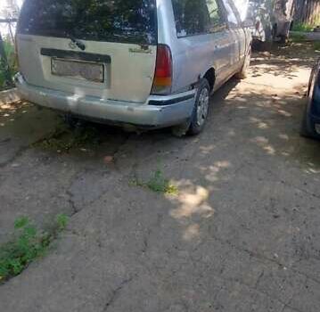 Сірий Ніссан Прімера, об'ємом двигуна 2 л та пробігом 70 тис. км за 2000 $, фото 2 на Automoto.ua