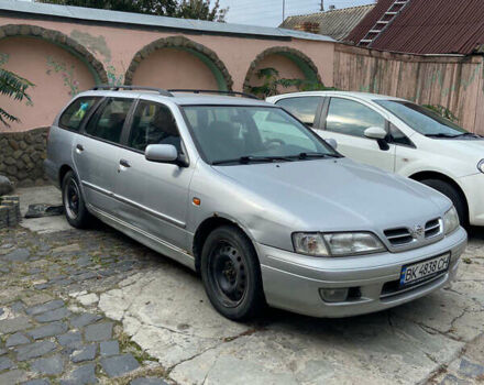 Серый Ниссан Примера, объемом двигателя 2 л и пробегом 300 тыс. км за 1500 $, фото 1 на Automoto.ua