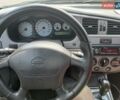 Серый Ниссан Примера, объемом двигателя 2 л и пробегом 216 тыс. км за 1999 $, фото 6 на Automoto.ua