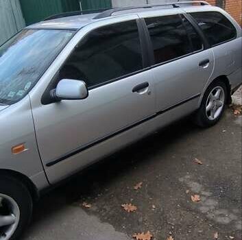 Серый Ниссан Примера, объемом двигателя 1.77 л и пробегом 277 тыс. км за 2900 $, фото 2 на Automoto.ua