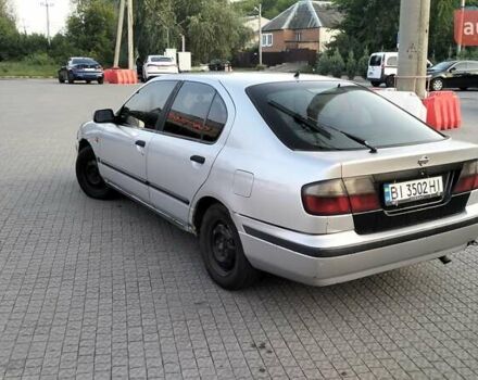 Сірий Ніссан Прімера, об'ємом двигуна 2 л та пробігом 350 тис. км за 2000 $, фото 6 на Automoto.ua