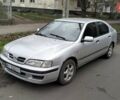 Сірий Ніссан Прімера, об'ємом двигуна 2 л та пробігом 350 тис. км за 2000 $, фото 1 на Automoto.ua