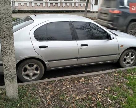 Сірий Ніссан Прімера, об'ємом двигуна 2 л та пробігом 350 тис. км за 2000 $, фото 4 на Automoto.ua