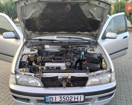 Сірий Ніссан Прімера, об'ємом двигуна 2 л та пробігом 350 тис. км за 2000 $, фото 5 на Automoto.ua