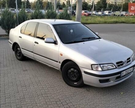 Сірий Ніссан Прімера, об'ємом двигуна 2 л та пробігом 350 тис. км за 2000 $, фото 8 на Automoto.ua