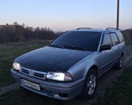 Серый Ниссан Примера, объемом двигателя 2 л и пробегом 300 тыс. км за 1650 $, фото 1 на Automoto.ua